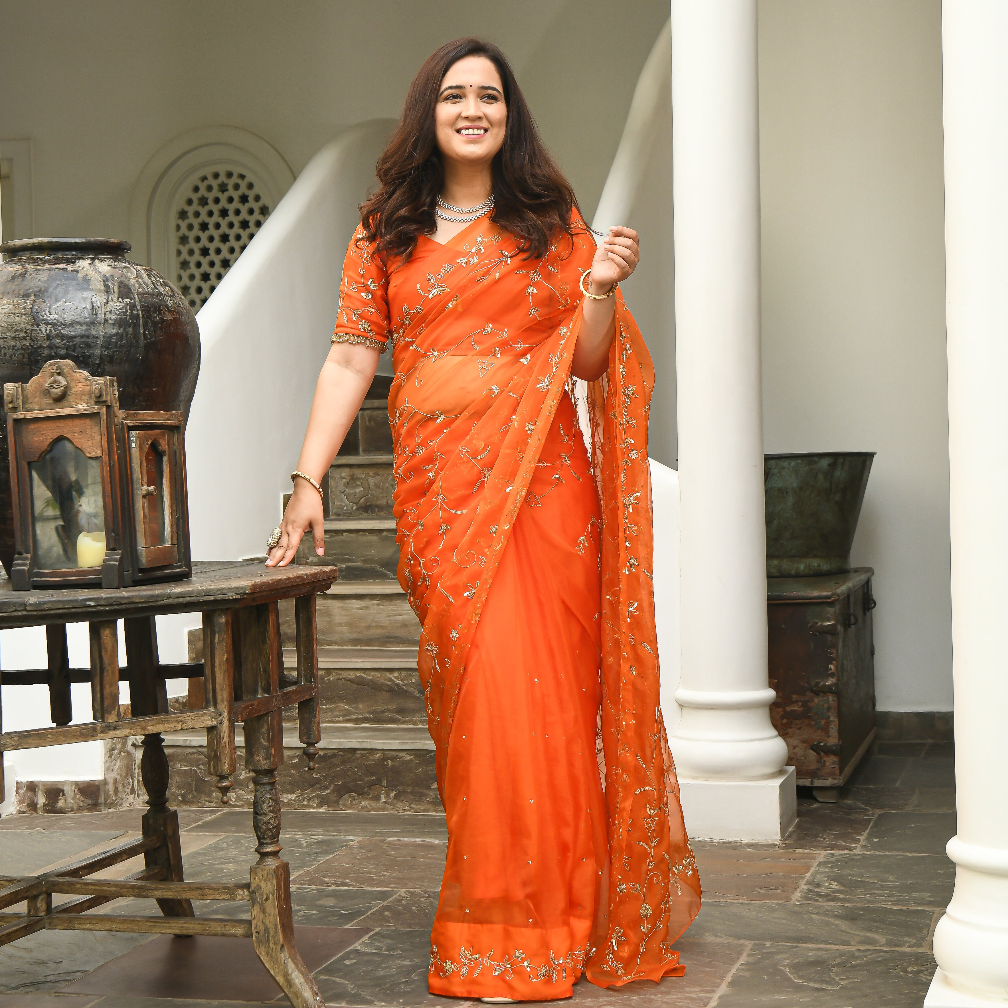 Trendy orange saree online for women